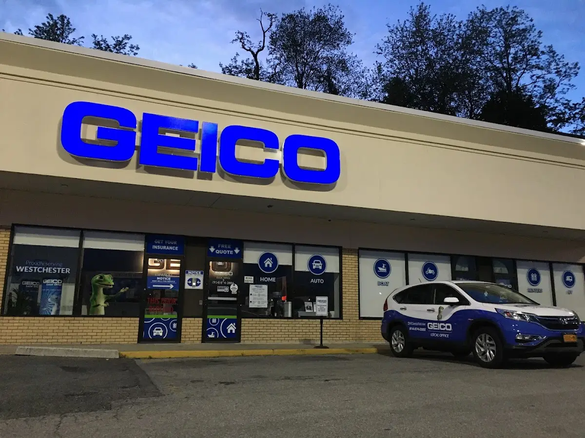 Logo de la compañía de seguros Weezie Mullaly - GEICO Insurance Agent